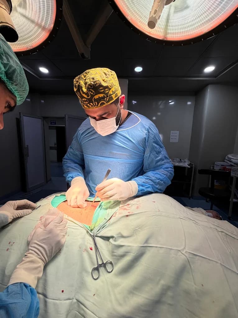 Dr. Haseeb consulting with patient